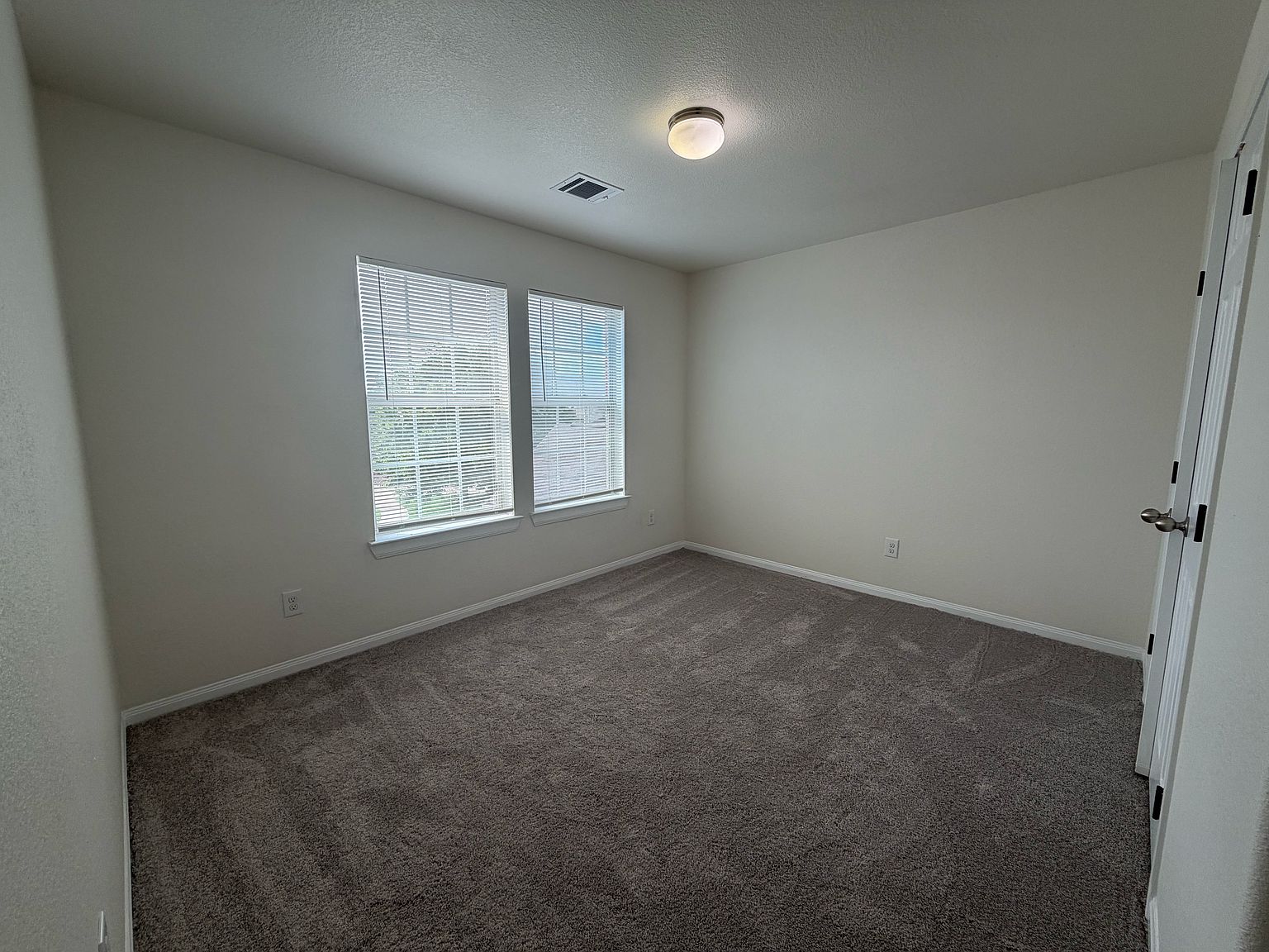 Secondary bedroom with double window